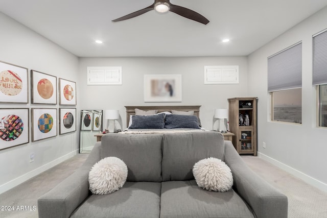 carpeted bedroom with ceiling fan