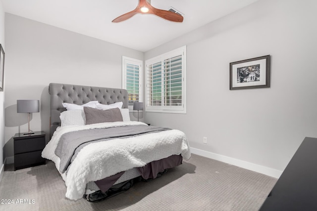 bedroom with ceiling fan and carpet