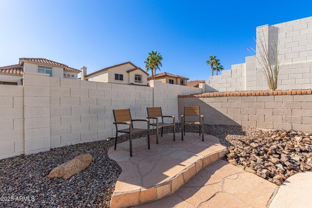 view of patio featuring a fenced backyard