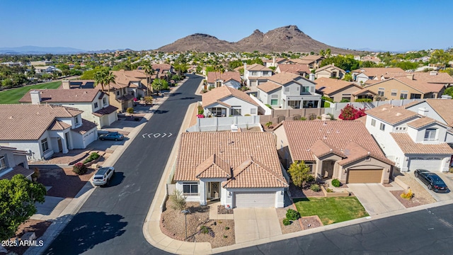 drone / aerial view with a mountain view and a residential view