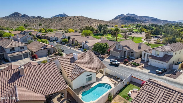 aerial view featuring a mountain view and a residential view