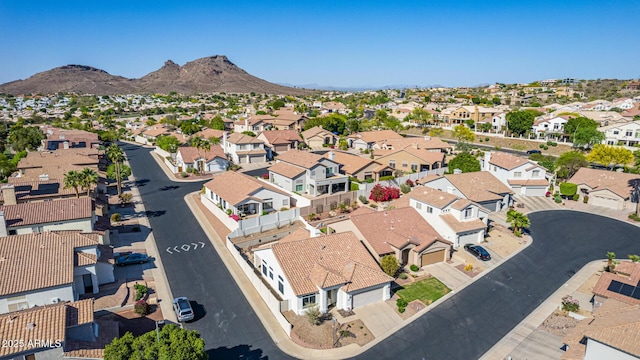 bird's eye view featuring a mountain view and a residential view