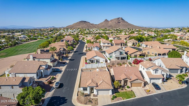 drone / aerial view with a mountain view and a residential view