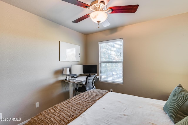 bedroom featuring ceiling fan