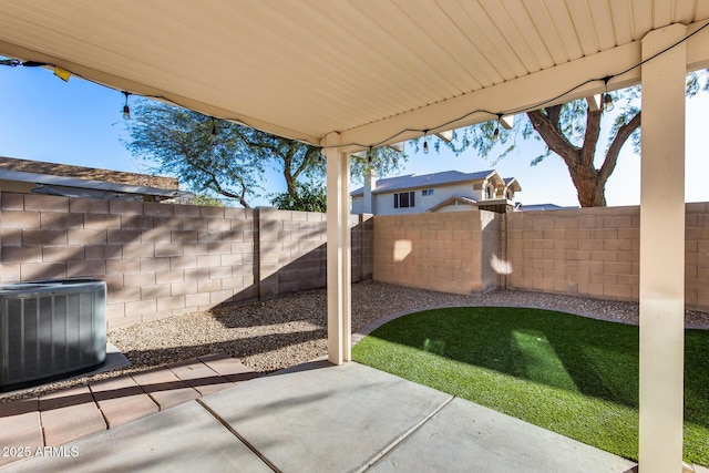 view of patio / terrace featuring central AC and a fenced backyard