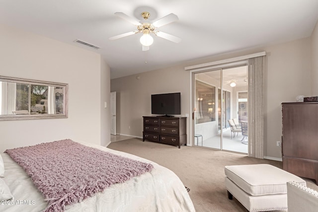 carpeted bedroom featuring visible vents, a ceiling fan, ensuite bath, baseboards, and access to exterior