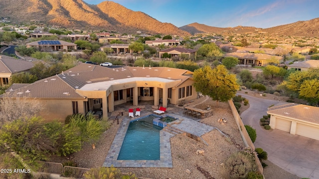 11986 N 134th Pl, Scottsdale, AZ 85259 - aerial perspective of suburban area featuring a mountain backdrop and a pool area