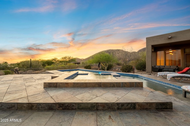 11986 N 134th Pl, Scottsdale, AZ 85259 - outdoor pool with outdoor lounge area, a patio, an in-ground hot tub, and a mountain view