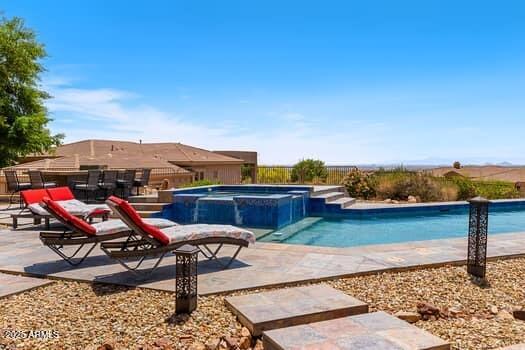 11986 N 134th Pl, Scottsdale, AZ 85259 - view of pool with a patio area and a pool with connected hot tub