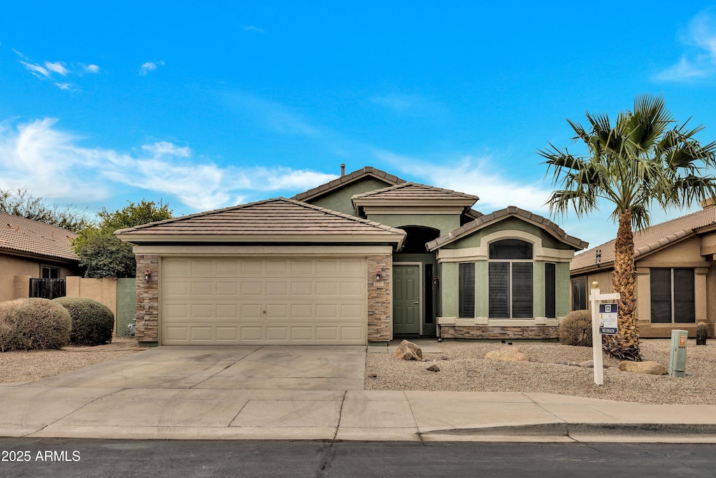 view of front of property featuring a garage