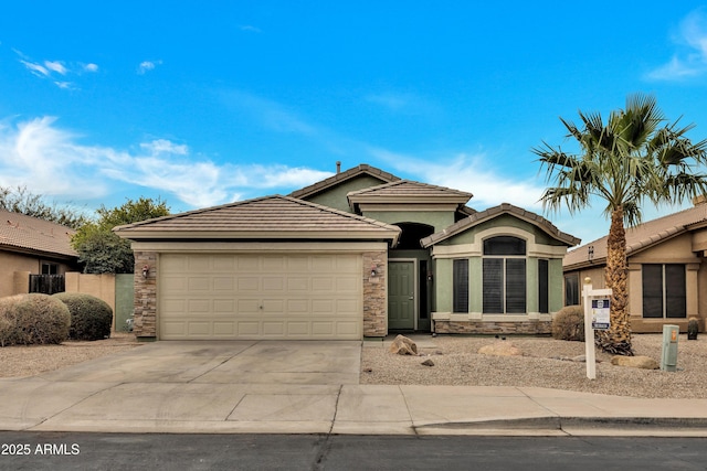 view of front of property featuring a garage