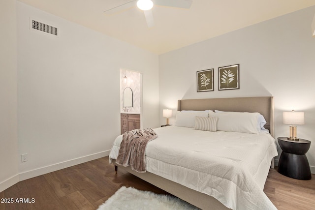 7710 E Gainey Ranch Rd Unit 142, Scottsdale, AZ 85258 - bedroom featuring wood finished floors, baseboards, ensuite bath, and a ceiling fan