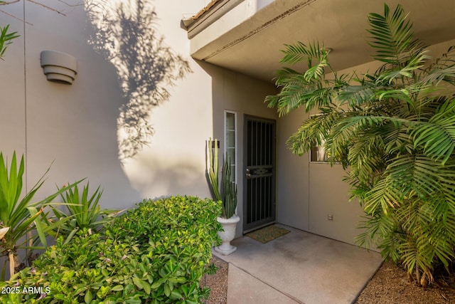 7710 E Gainey Ranch Rd Unit 142, Scottsdale, AZ 85258 - property entrance with stucco siding
