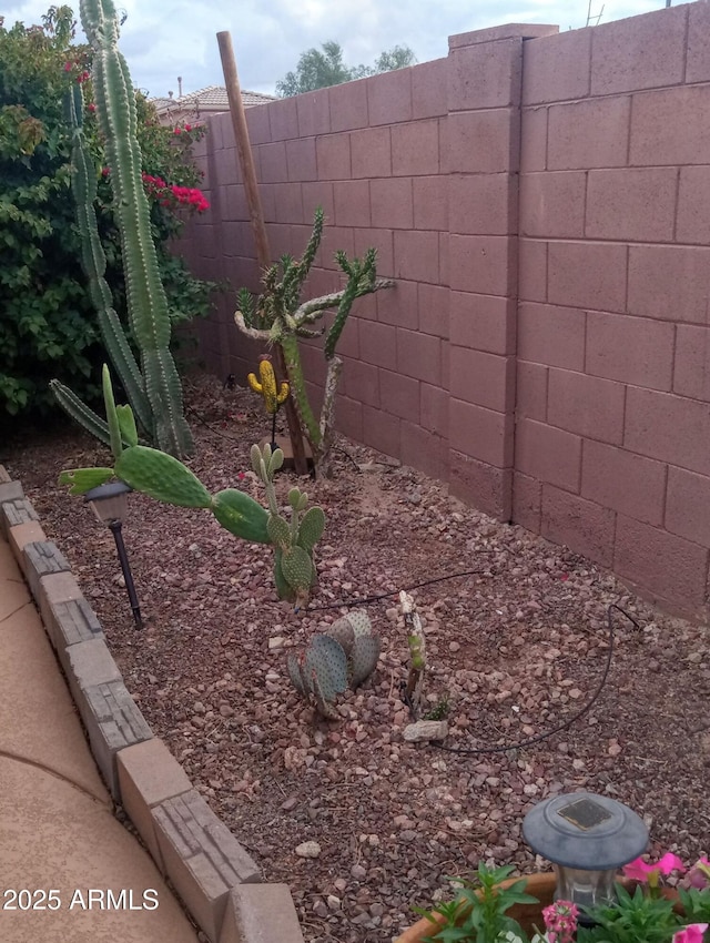 view of yard featuring fence