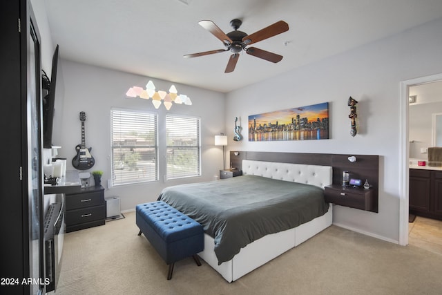 19700 N 76th St Unit 2057, Scottsdale, AZ 85255 - bedroom with light colored carpet, ensuite bathroom, and ceiling fan