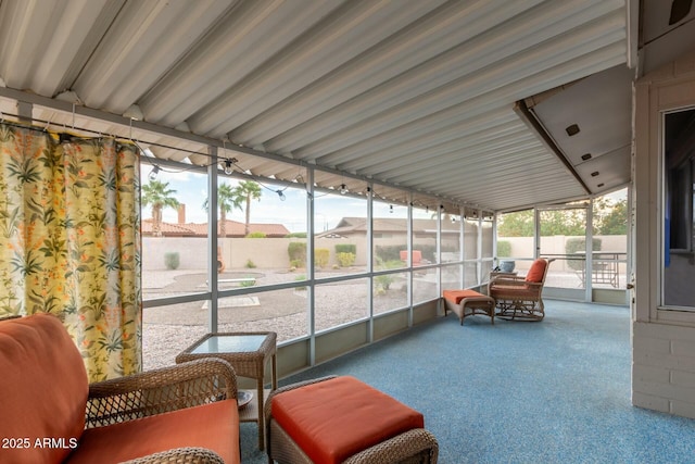 sunroom featuring a healthy amount of sunlight