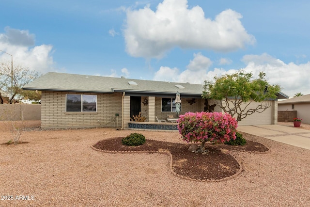 ranch-style home featuring a garage