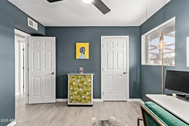6739 N 16th St Unit 14, Phoenix, AZ 85016 - bedroom with multiple windows, wood finished floors, and ceiling fan