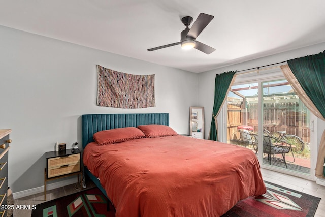 6739 N 16th St Unit 14, Phoenix, AZ 85016 - tiled bedroom with access to exterior and a ceiling fan