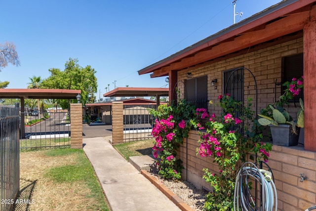 6739 N 16th St Unit 14, Phoenix, AZ 85016 - view of home's exterior featuring a gate