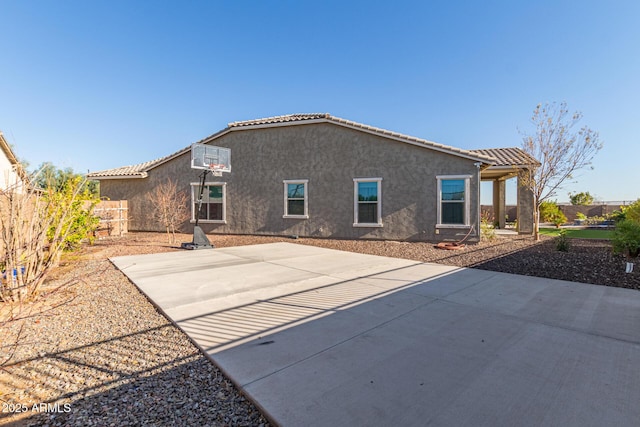 back of house featuring a patio