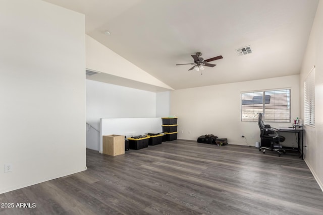 interior space featuring vaulted ceiling, dark hardwood / wood-style floors, and ceiling fan