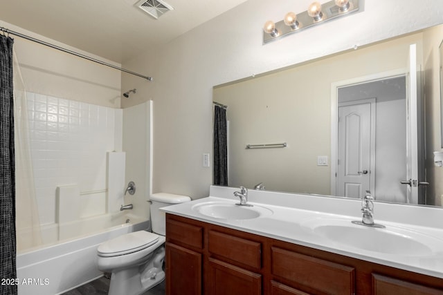 full bathroom with vanity, toilet, and shower / bath combo