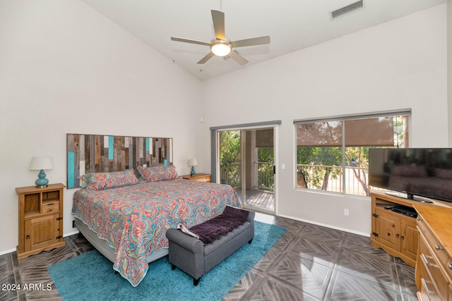 bedroom featuring access to exterior, ceiling fan, dark parquet flooring, and high vaulted ceiling