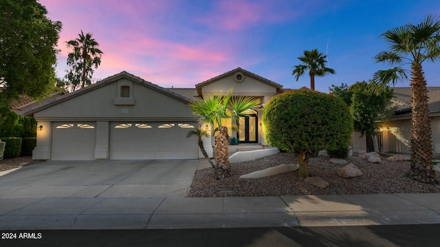 view of front of property featuring a garage