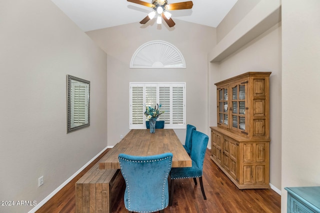 dining room with ceiling fan, dark wood-type flooring, and lofted ceiling