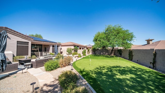 view of yard featuring an outdoor hangout area and a patio area