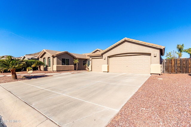 ranch-style home featuring a garage