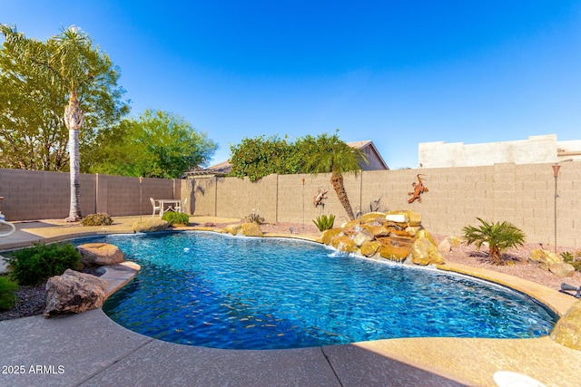 view of pool with pool water feature