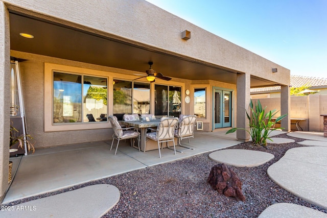 view of patio with ceiling fan