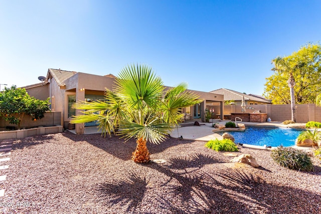 view of swimming pool with a patio