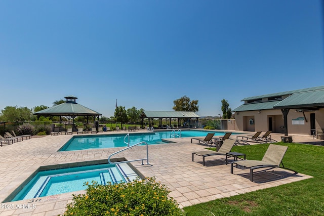 view of pool with a gazebo, a community hot tub, and a patio