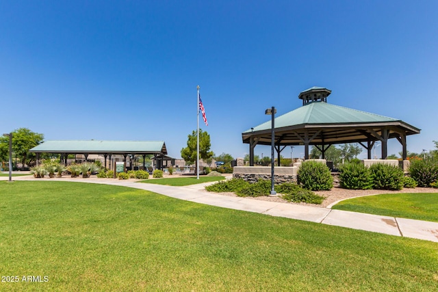 view of community featuring a gazebo and a lawn