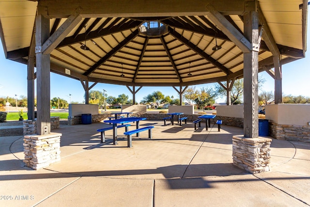 surrounding community with a gazebo and a patio