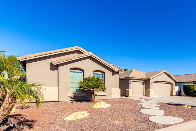 view of front of home with a garage