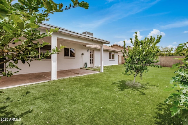 rear view of property with a patio area