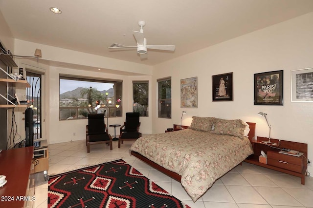 bedroom with light tile patterned floors