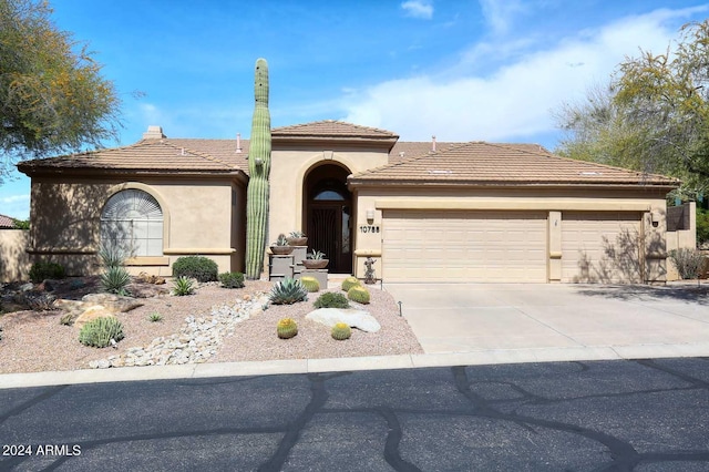 view of front of house with a garage