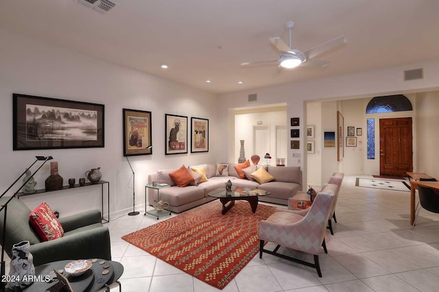 living room featuring ceiling fan and light tile patterned floors