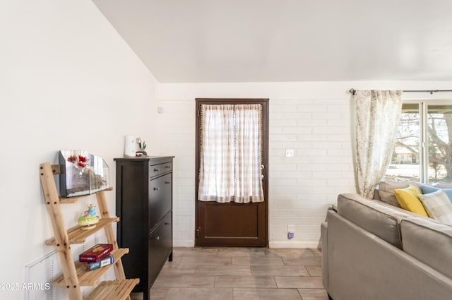 interior space featuring lofted ceiling