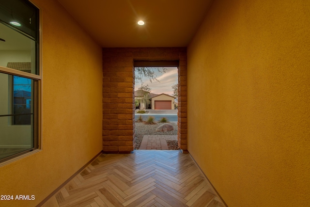 hall with parquet flooring