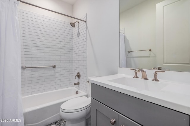 full bath with toilet, shower / tub combo, and vanity