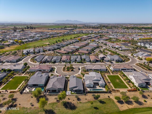 bird's eye view featuring a mountain view and a residential view