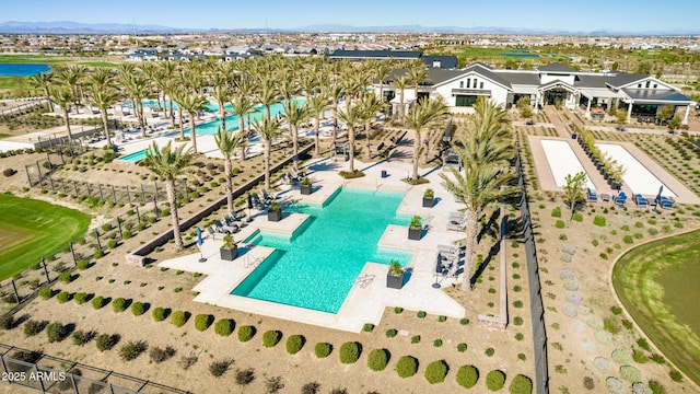 birds eye view of property with a residential view and a water view