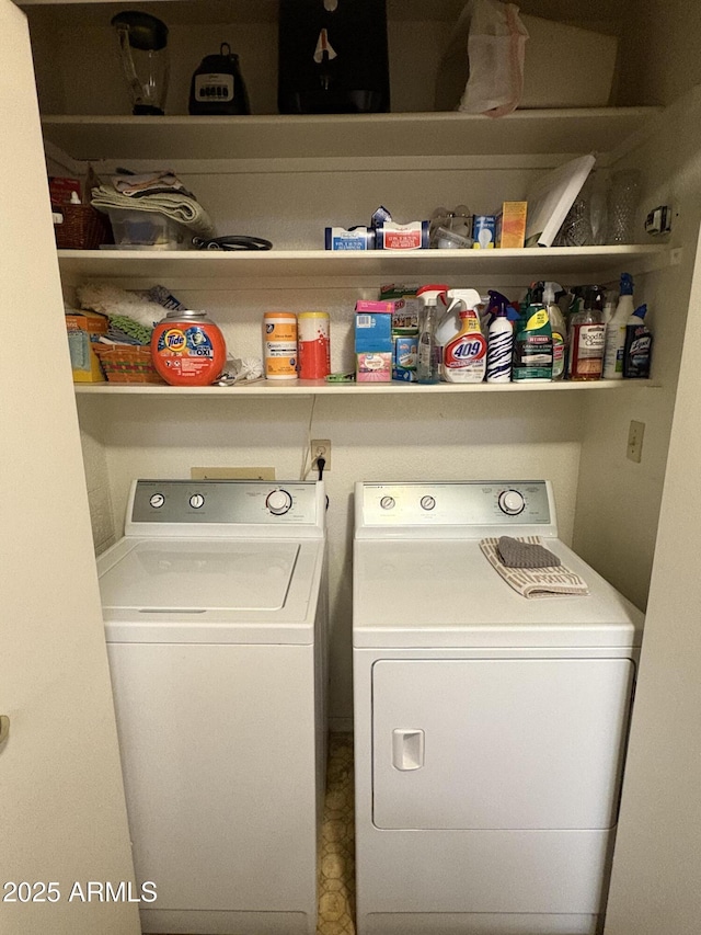 laundry room with washer and clothes dryer