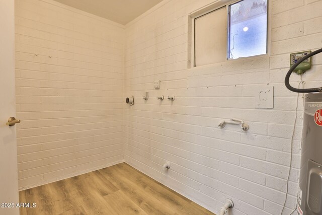 5510 E Dallas St, Mesa, AZ 85205 - laundry room featuring light wood-type flooring and water heater
